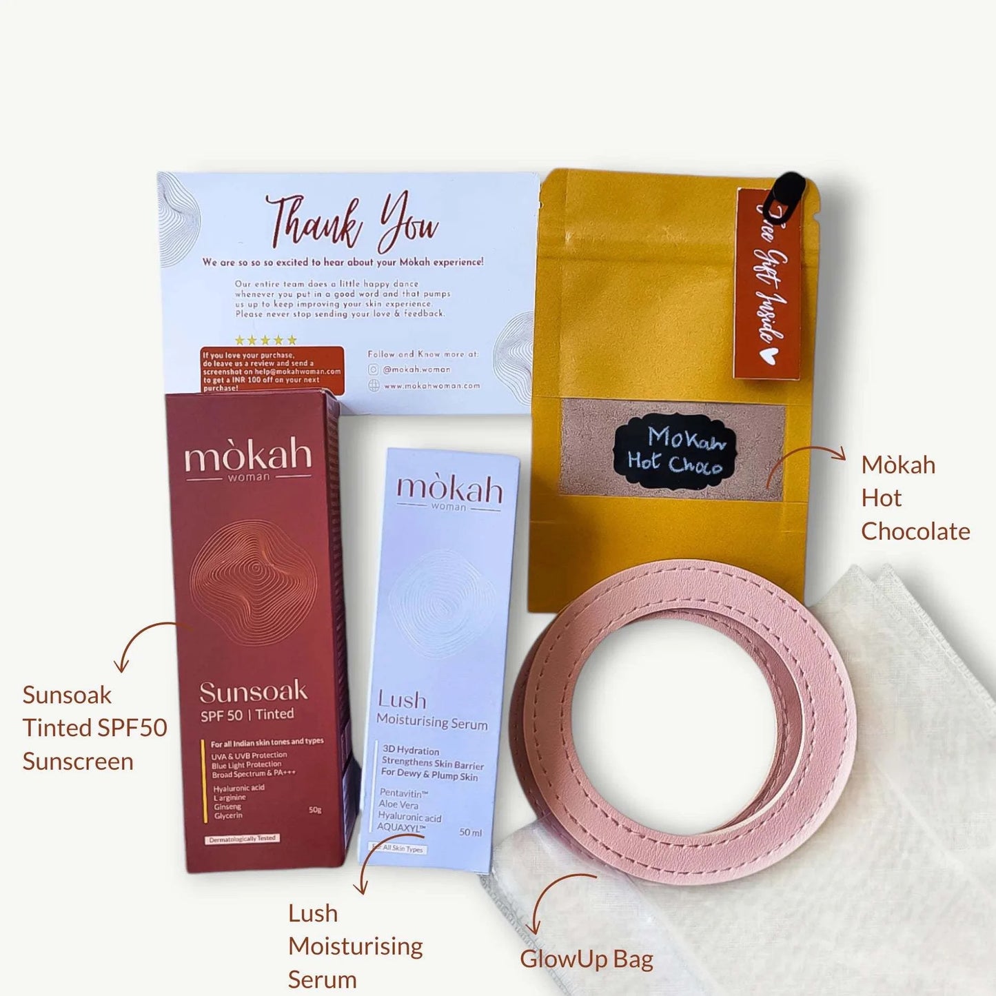 Mòkah Skin Love Duo set with Lush Moisturising Serum, Sunsoak Tinted SPF 50, Mokah Hot Chocolate, and GlowUp Bag.