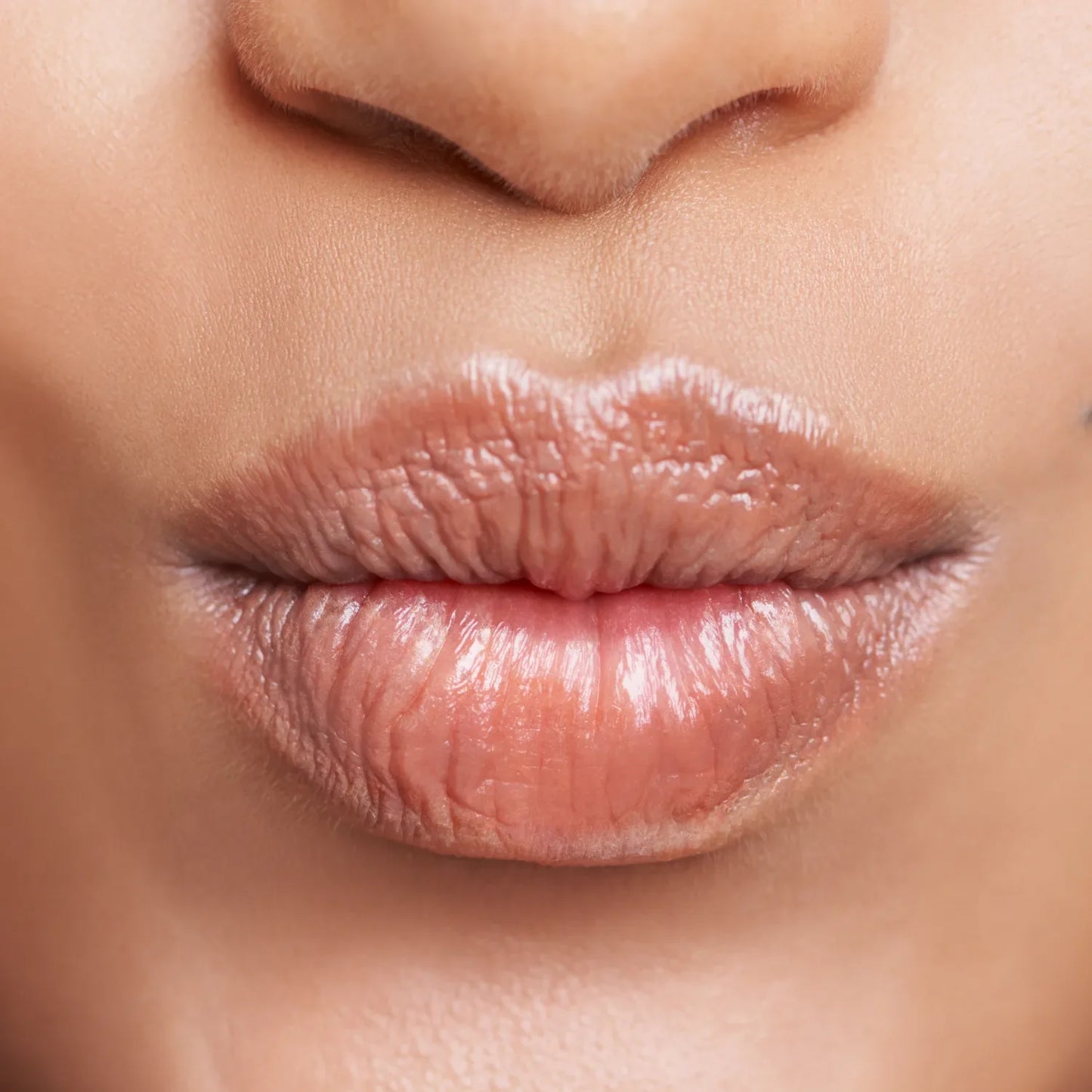 Dew Non-Tinted Lip Balm on smooth lips, moisturizing with SPF 30 protection.