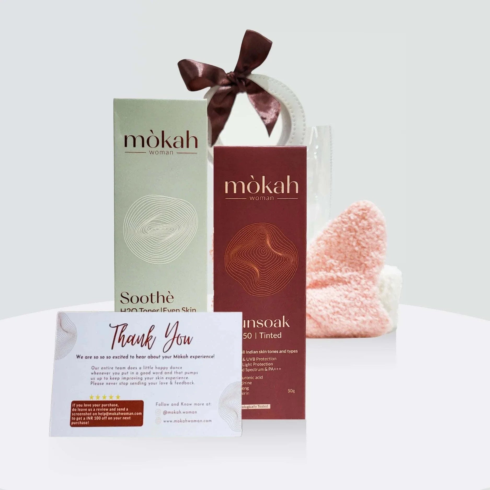 Mòkah Pollution Protect Duo with Soothè Toner and Sunsoak SPF 50, featuring a skincare band and GlowUp bag for skin barrier protection.